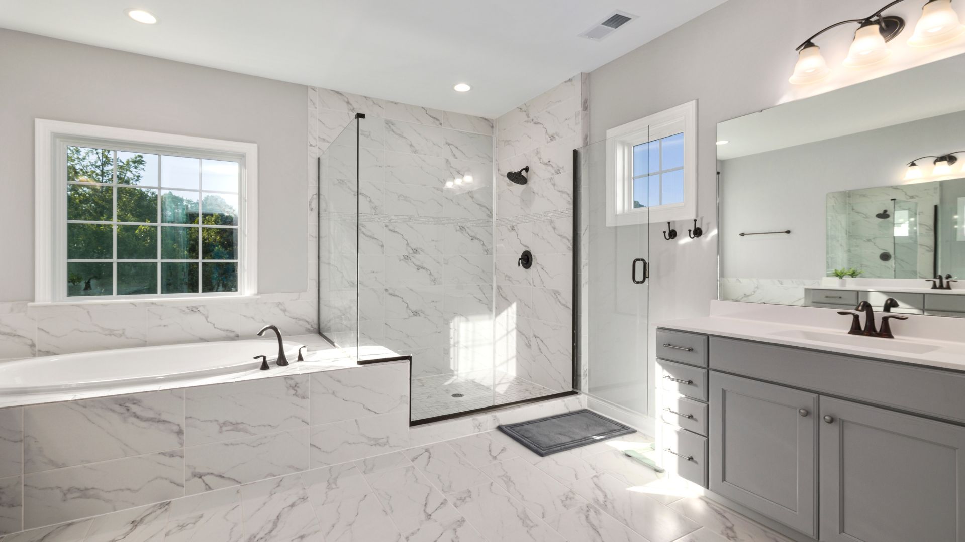 A large white bathroom with a walk in shower